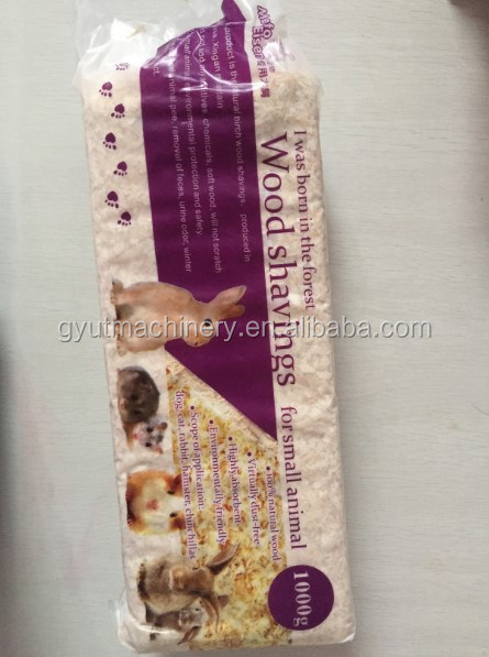 Material de embalagem de madeira Máquina de embalagem multifunção para roupa de cama de animais 1000g por saco